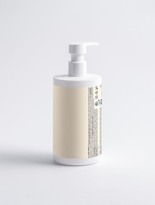 White bottle with beige label on a light gray background