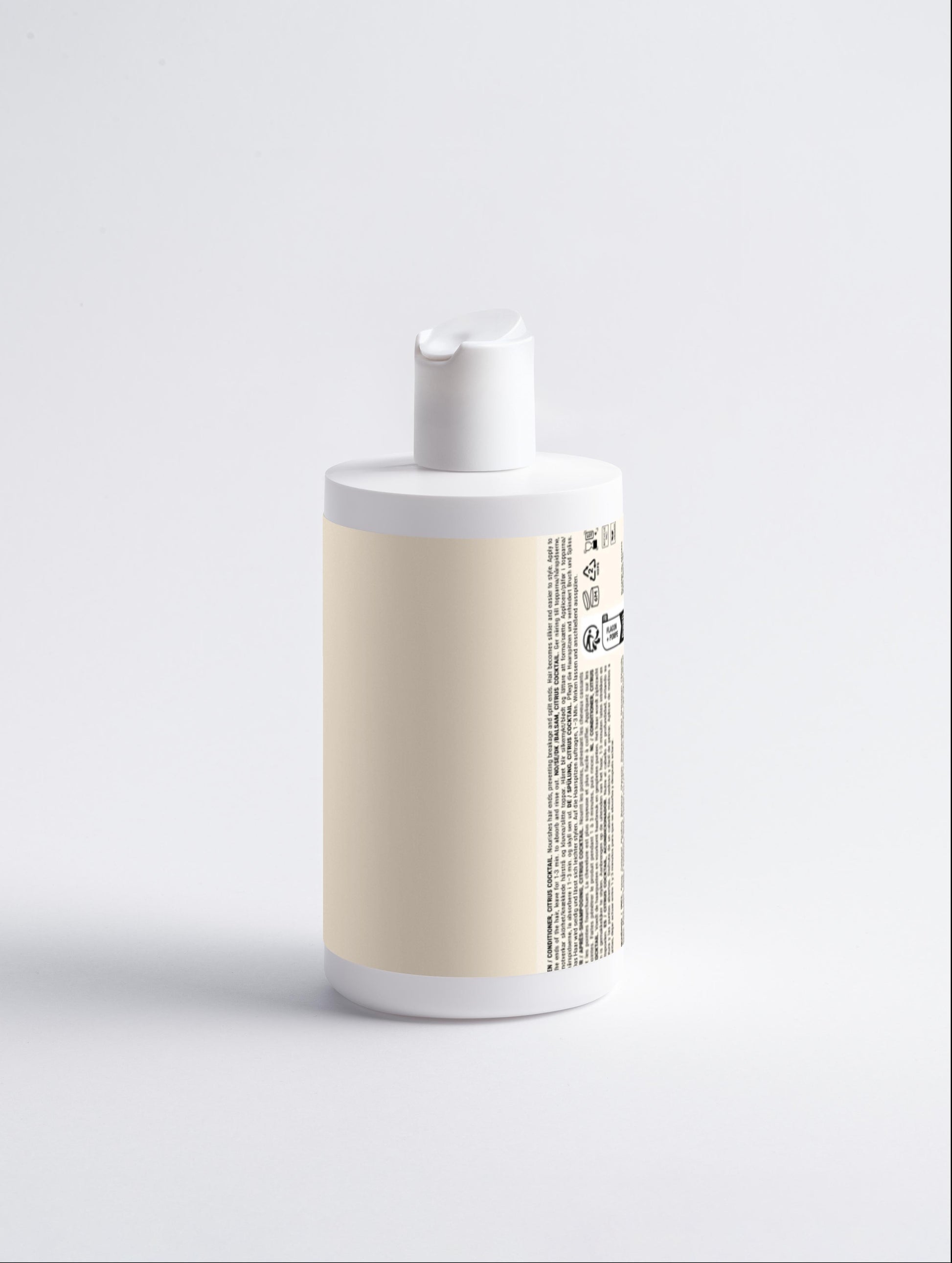 White and beige bottle with a label on a light gray background