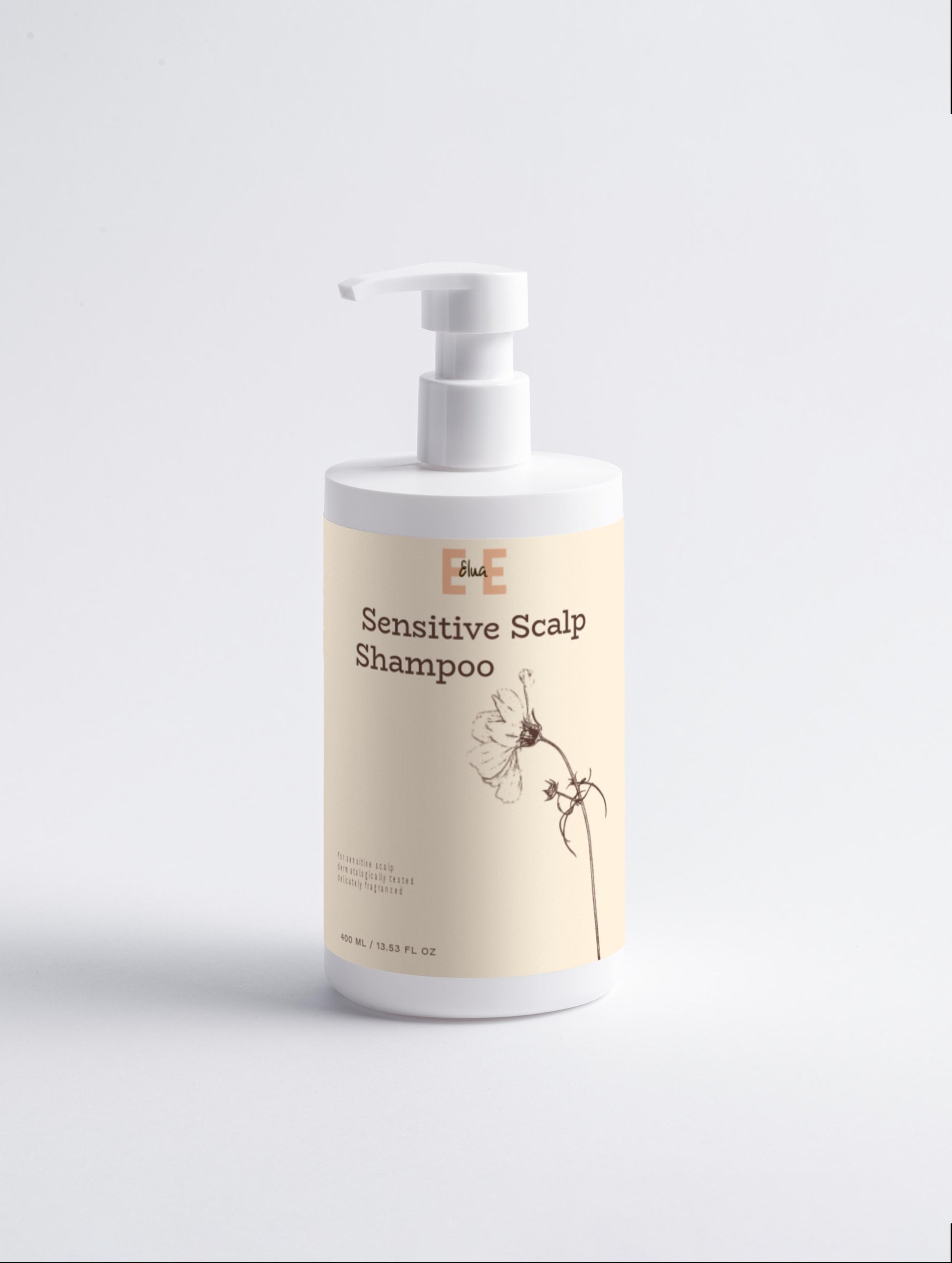 Sensitive Scalp Shampoo bottle with pump on a light gray background