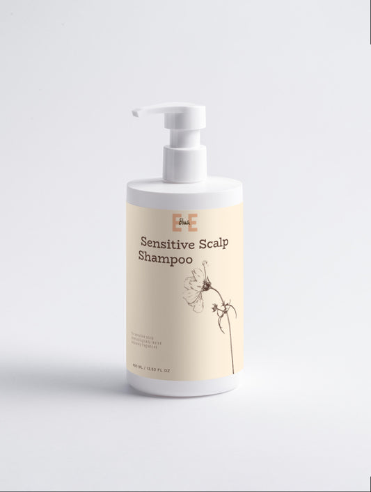 Sensitive Scalp Shampoo bottle with pump on a light gray background