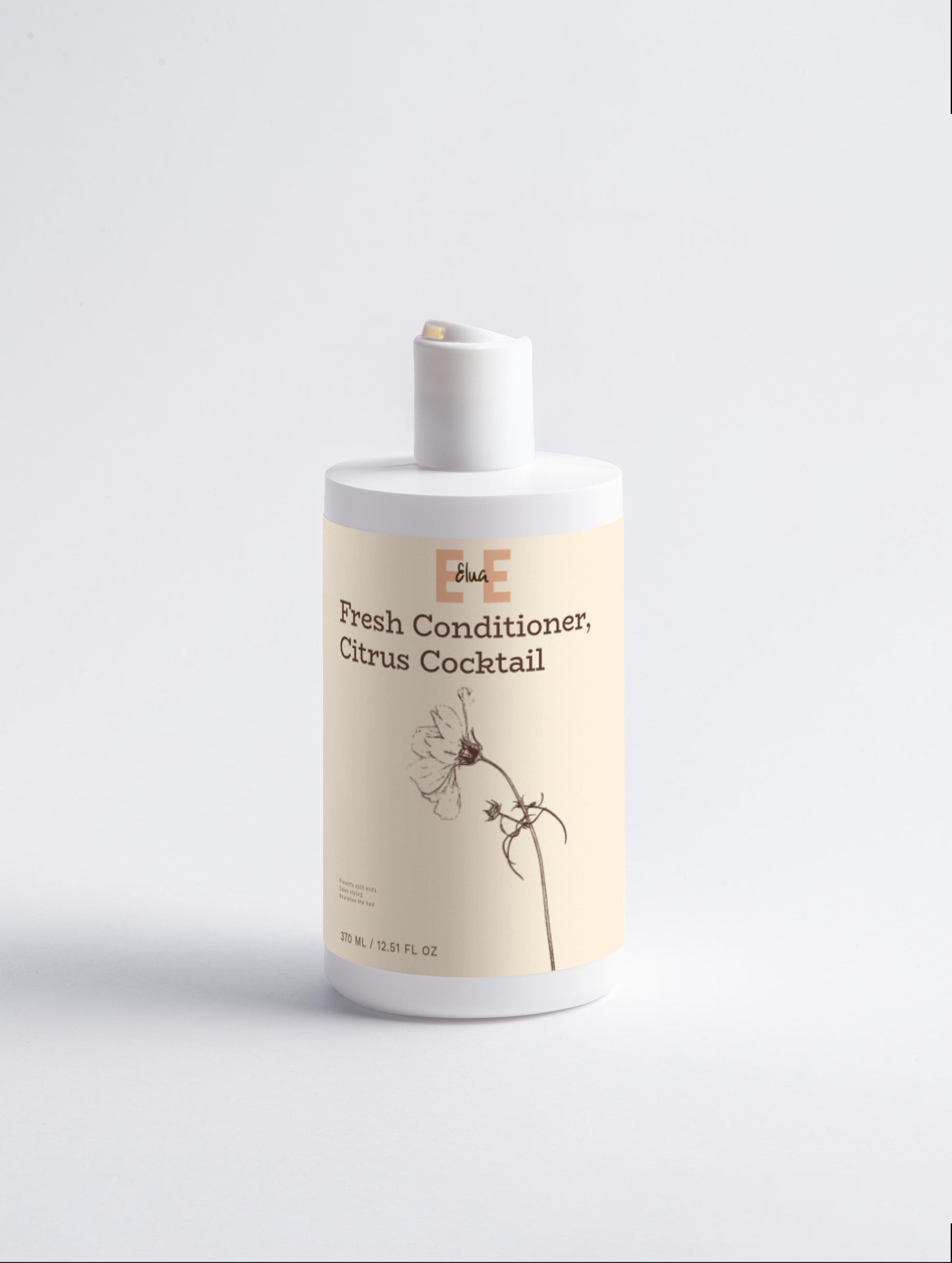 Bottle of 'Fresh Conditioner, Citrus Cocktail' on a light gray background