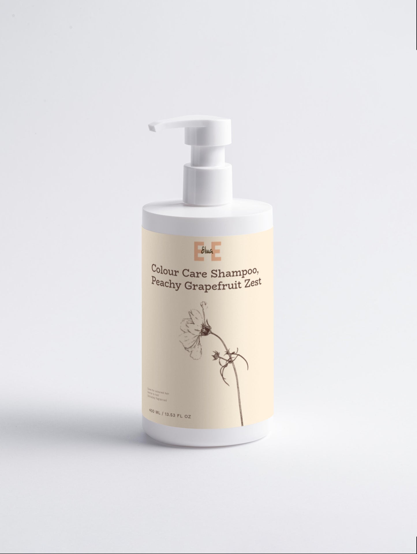 Shampoo bottle with a beige label on a light gray background