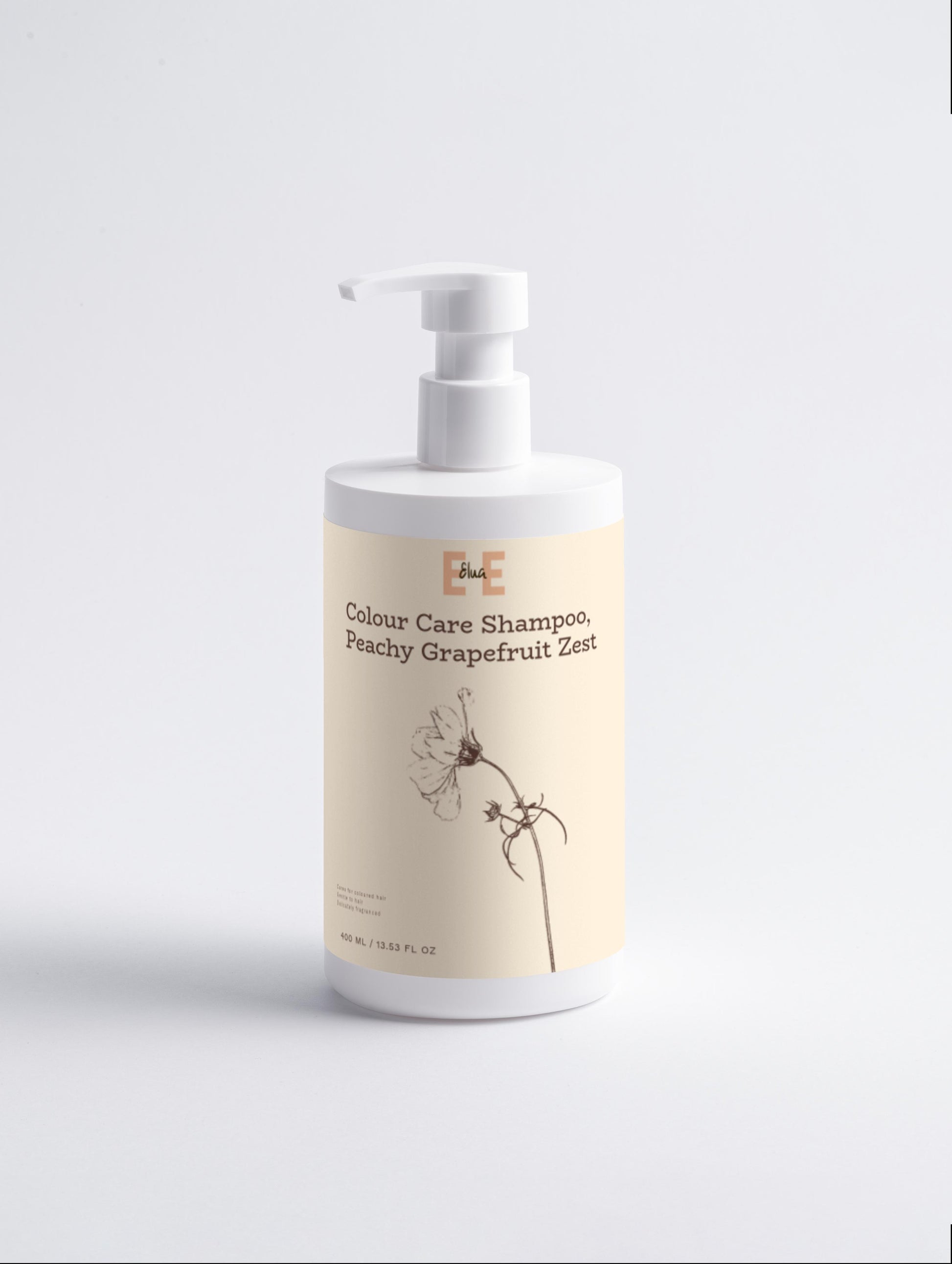 Shampoo bottle with a beige label on a light gray background