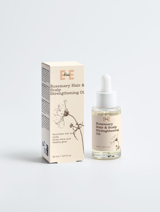 Rosemary hair and scalp strengthening oil with packaging on a white background