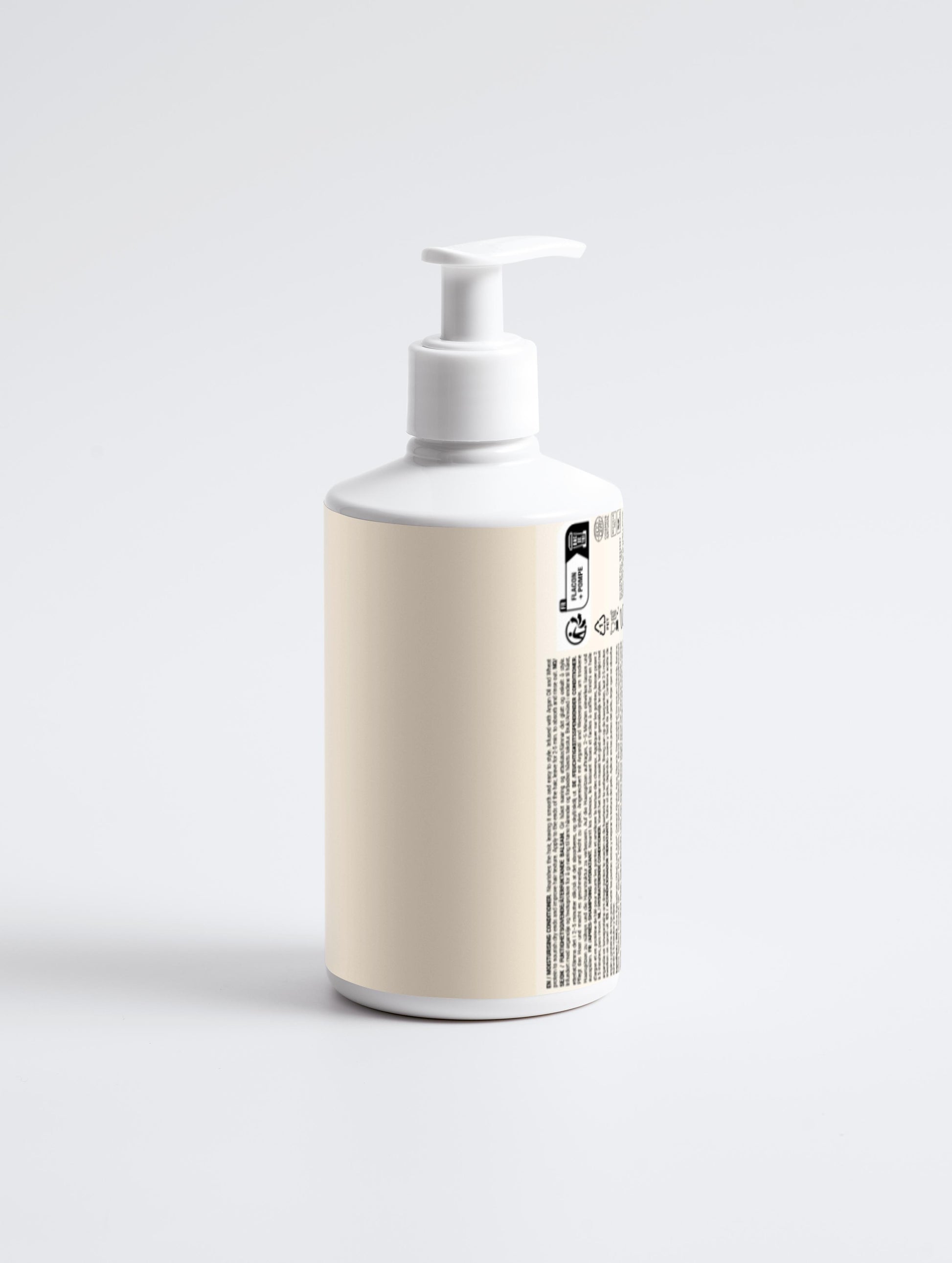 White bottle with a pump and beige label on a light gray background